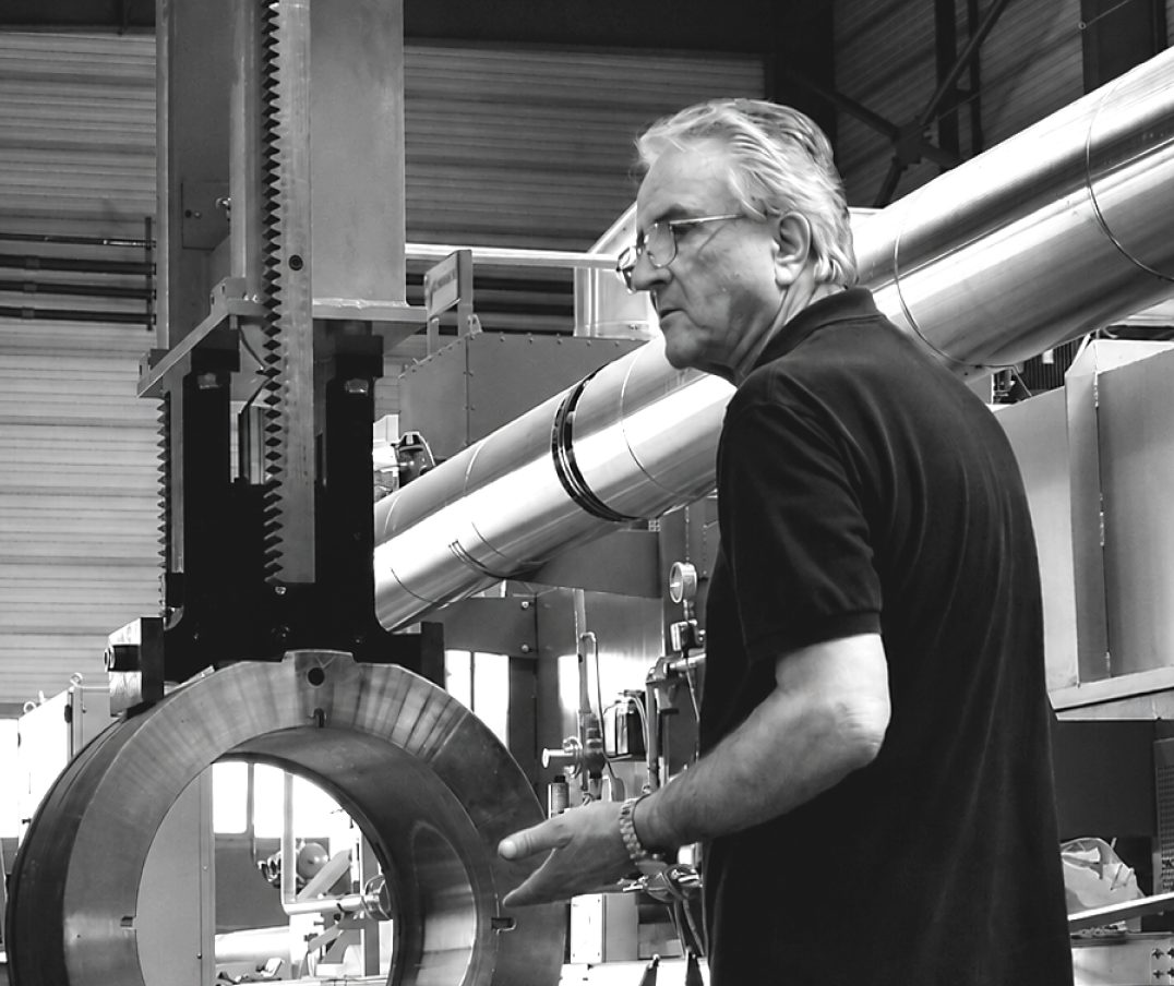 Costas Assimakis working on a machine