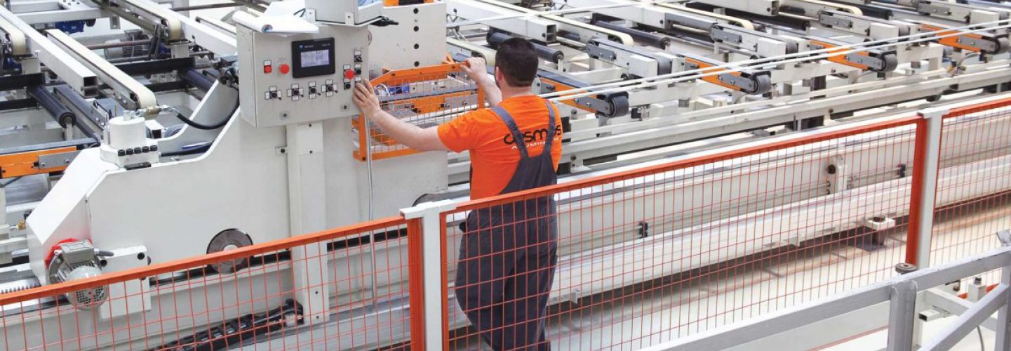Assimakis technician operating an extrusion handling line